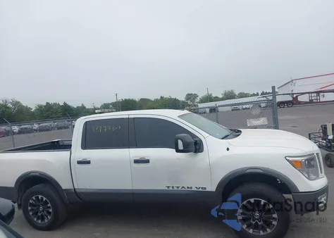 2019 Nissan Titan Pro-4X из США, поврежденный, VIN 1N6AA1E57KN504186